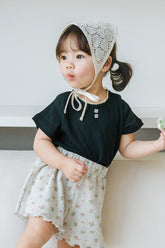 Toddler Girl Wearing Avauma Le Petite Classic Black Short Sleeve Top with Lace Skirt, Elegant Baby Girl Outfit